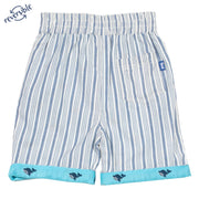 Boy in wonder whale shorts