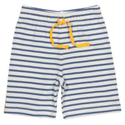 Boy in mini corfe shorts