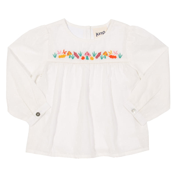 Girl in toadstool body blouse