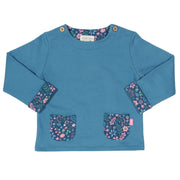 Girl in acorn sweatshirt