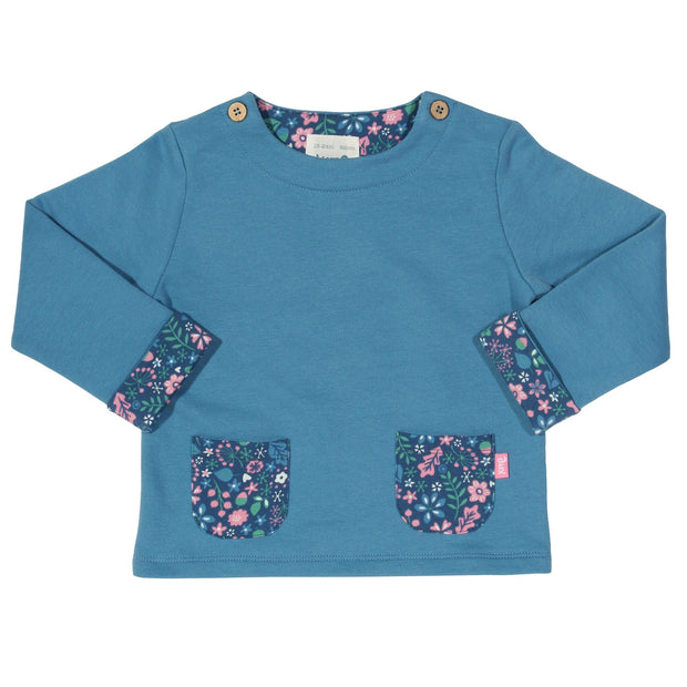 Girl in acorn sweatshirt