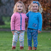 Girl in acorn sweatshirt