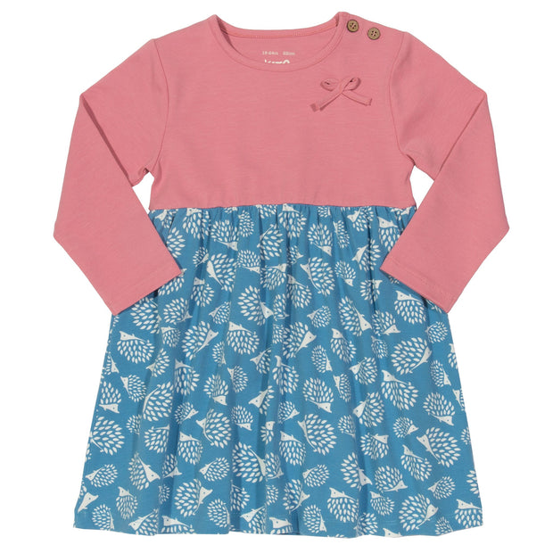 Girl in hedgehog bow dress