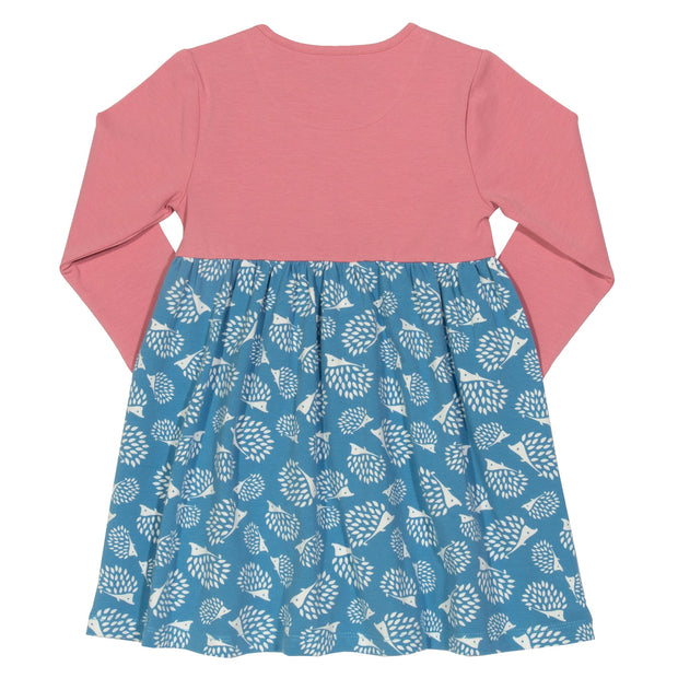 Girl in hedgehog bow dress