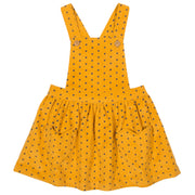 Girl in polka heart pinafore