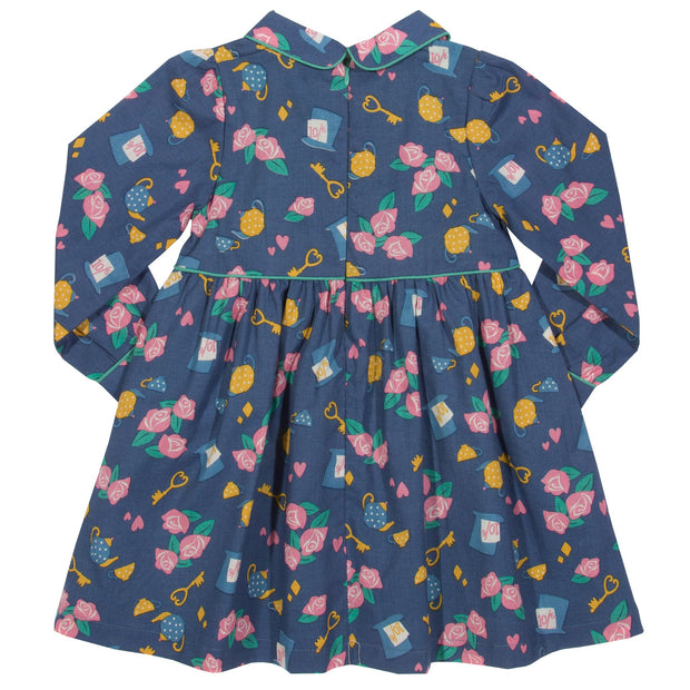 Girl in mini wonderland dress