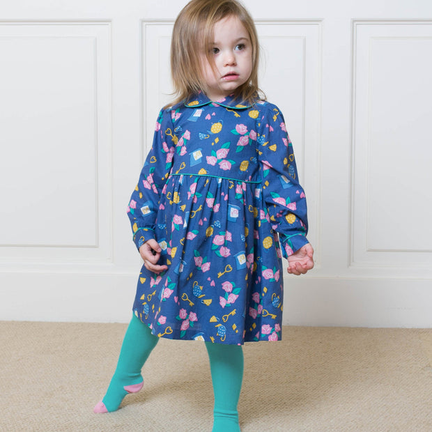 Girl in mini wonderland dress