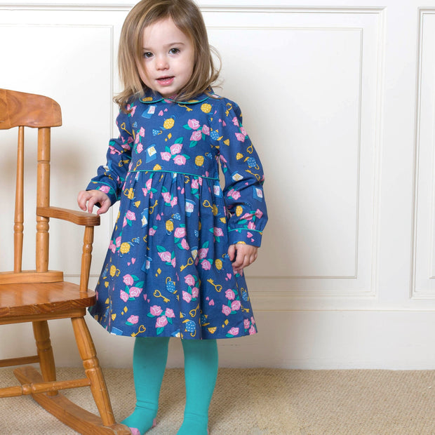 Girl in mini wonderland dress