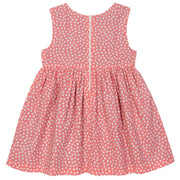 Girl in dotty gingham dress