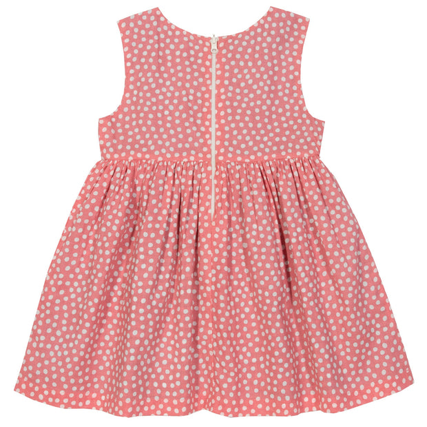 Girl in dotty gingham dress