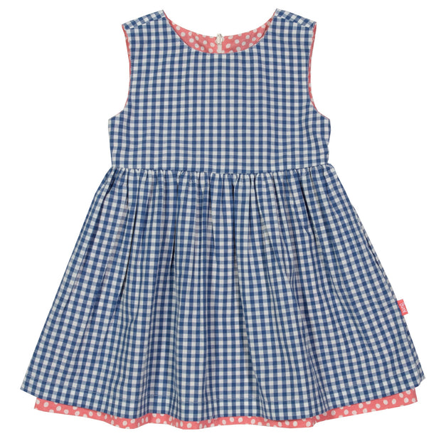 Girl in dotty gingham dress
