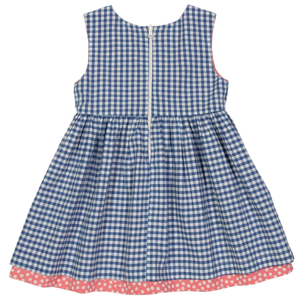 Girl in dotty gingham dress