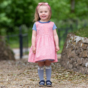 Girl in dotty gingham dress