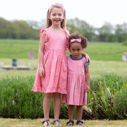Girl in dotty gingham dress