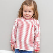 Girl in stripy heart jumper