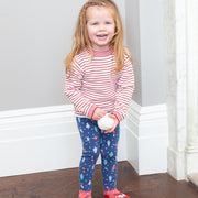 Girl in stripy heart jumper