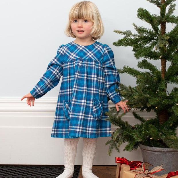 Girl in plaid party dress