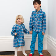 Girl in plaid party dress