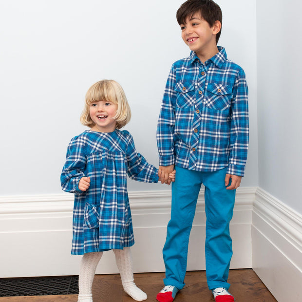 Girl in plaid party dress