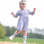 Girl in bee ditsy dress