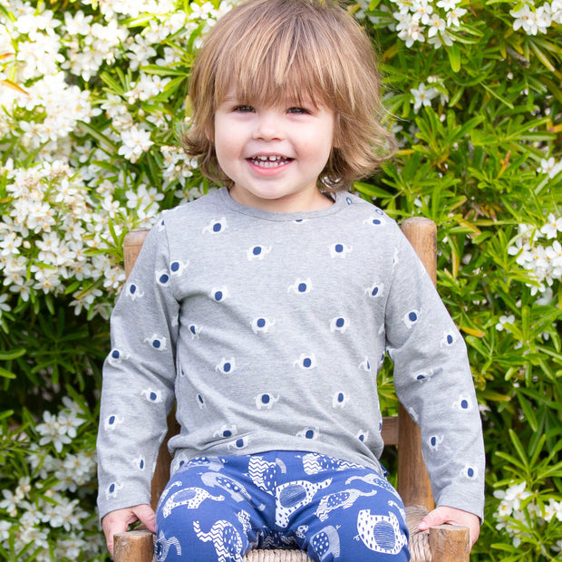 Child in ellie dot top